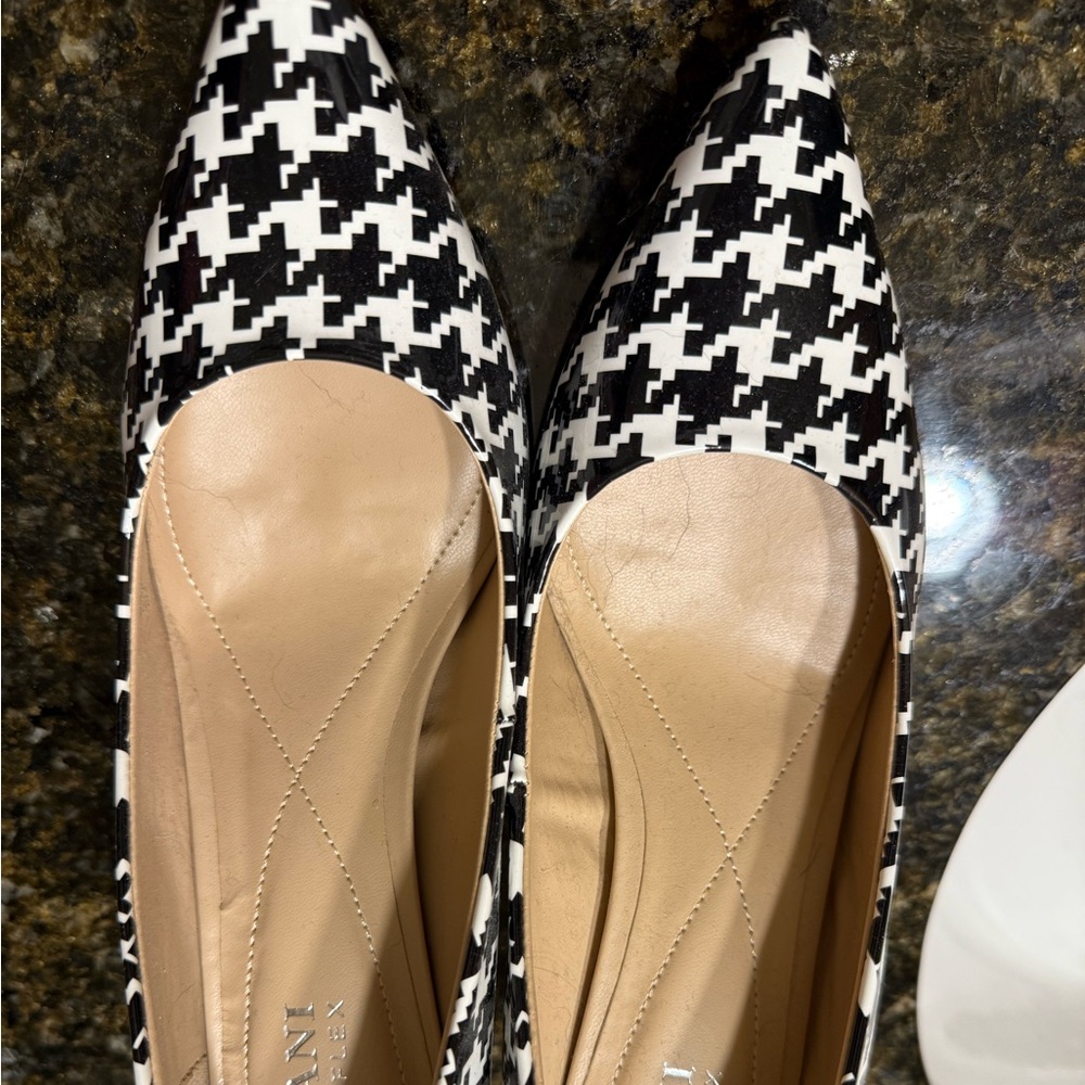 Checkered low heel, never worn.
